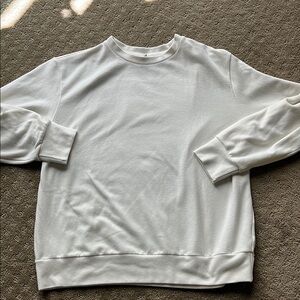 Uniqlo women’s sweater in cream, medium